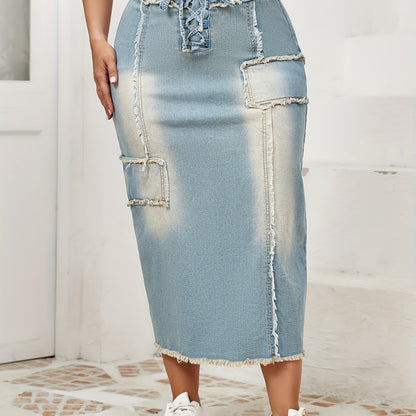 Women's high-waist denim midi skirt with frayed hem and lace-up details in a gradient light blue to dark wash. Raw edge detailing, versatile for spring/summer/fall.