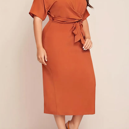 Stylish women's summer dress with bow tie waist, round neck, and short sleeves. Made of lightweight polyester, machine washable. Ideal for casual or formal events.