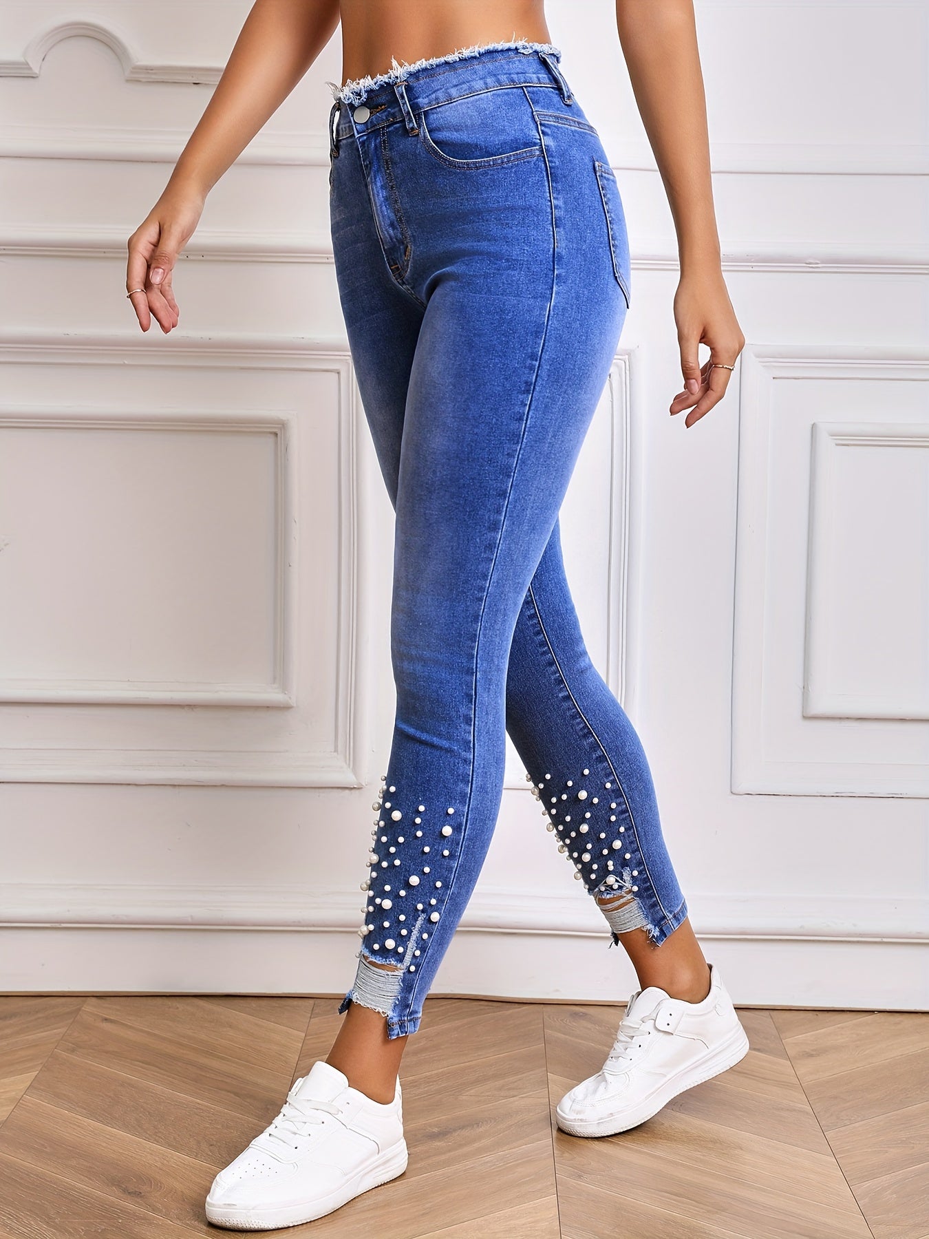 Women's high stretch tight jeans with faux pearl décor