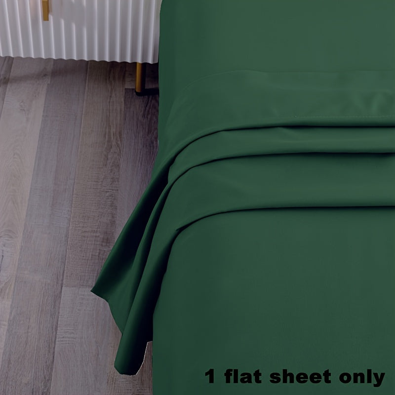 Soft and luxurious 100% microfiber flat sheet in a solid color with a brushed finish - Easy to care for with machine washable material, perfect for any bedroom or guest room.