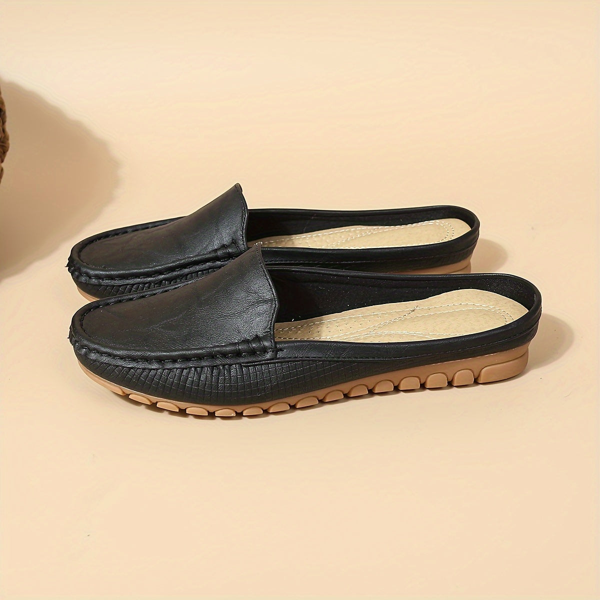 Stylish slip-on mule sandals with half-toe design, perfect for summer.