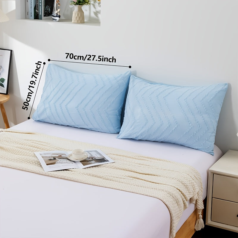 Two pillowcases in a set, each measuring 50x70cm, featuring a stylish Bubble Gauze & Cutwork design made of 100% polyester. These skin-friendly pillowcases are perfect for all seasons and are machine washable. They are made using active printing