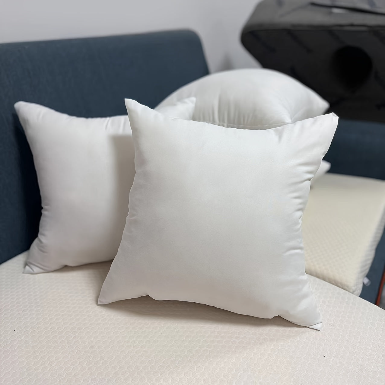 White brushed pillow insert made of breathable soft natural material for a high-quality sleep experience, providing cloud-like comfort.