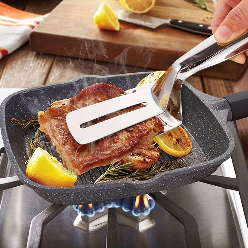 Non-stick steel fish frying spatula for home kitchen.