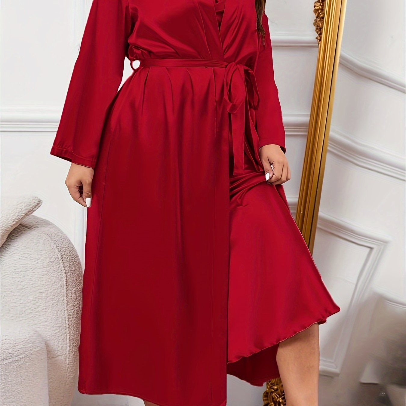 Elegant satin pajama set for plus size women, including slip dress and robe with belt. Perfect for fall and winter.