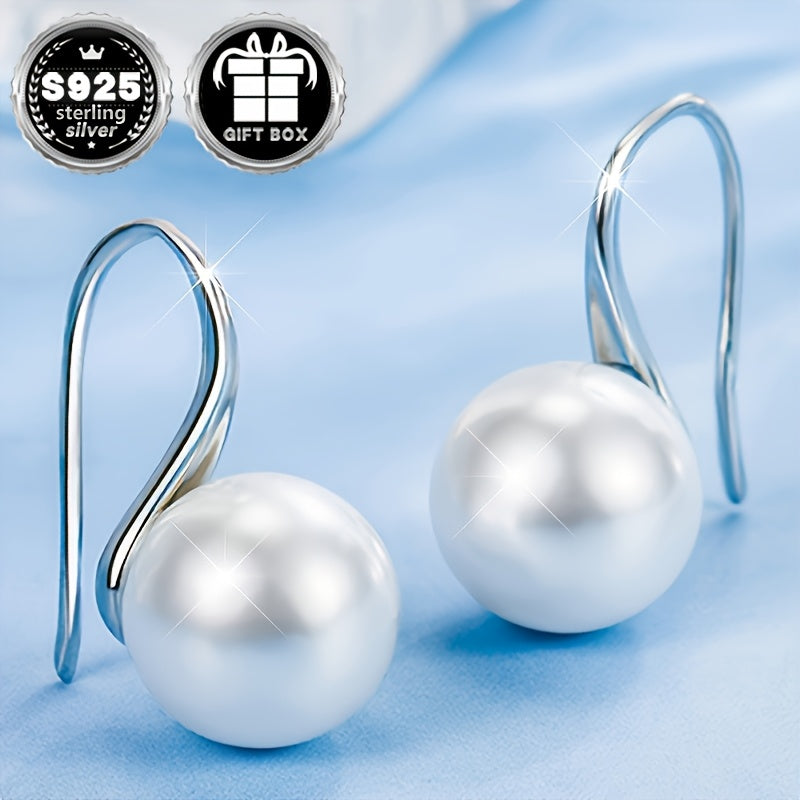 Classy and chic earrings designed for women, showcasing a timeless and minimalist style accented with lovely pearl details. Crafted from 1.55g of high-quality 925 silver, these earrings are perfect for everyday wear, work, special events, and make a