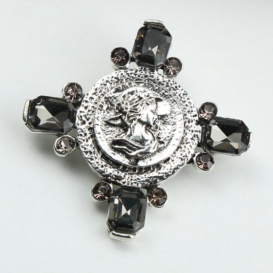 Vintage Head Brooch - A beautiful accessory for women's dresses, sweaters, and clothing embellished with sparkling rhinestones.