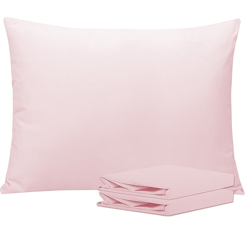 Get two sets of white pillowcases that are perfect for families, hotels, and apartments. These pillowcases provide a comfortable experience with their soft and breathable material. Made of high-quality fabric, they are suitable for bedroom, sofa, and