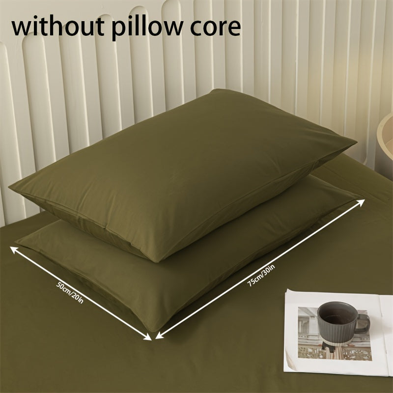 Get two ultra-soft brushed polyester pillowcases, weighing 90g each in a sleek light purple color. These rectangular pillowcases measure 50.8x76.2cm and feature an envelope closure. They are machine washable and perfect for adding cozy comfort to your