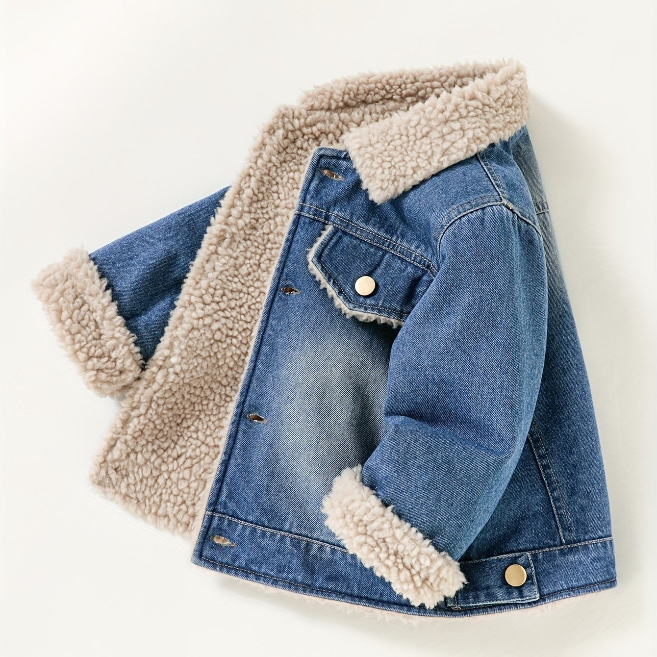 Warm, casual denim jacket lined with cozy fleece for boys in Fall/Winter.