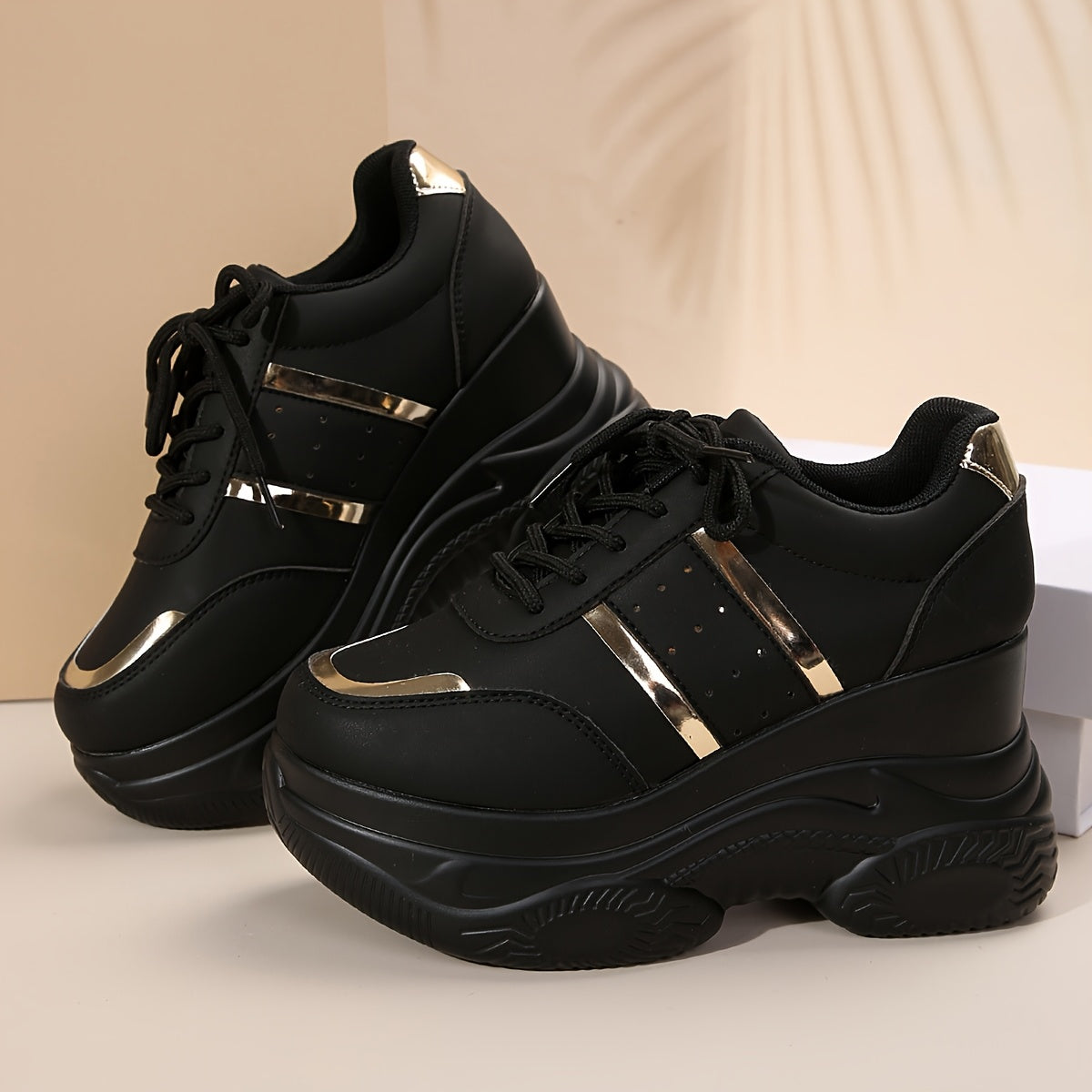 Gold-trimmed lace-up height-increasing casual sports shoes for women.