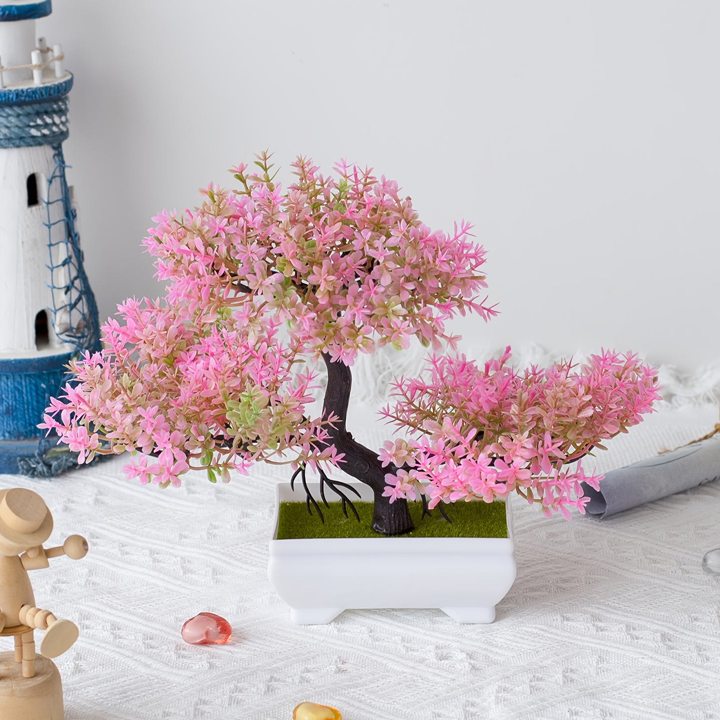 Small plastic bonsai for wholesale with a realistic look, perfect for home decoration.