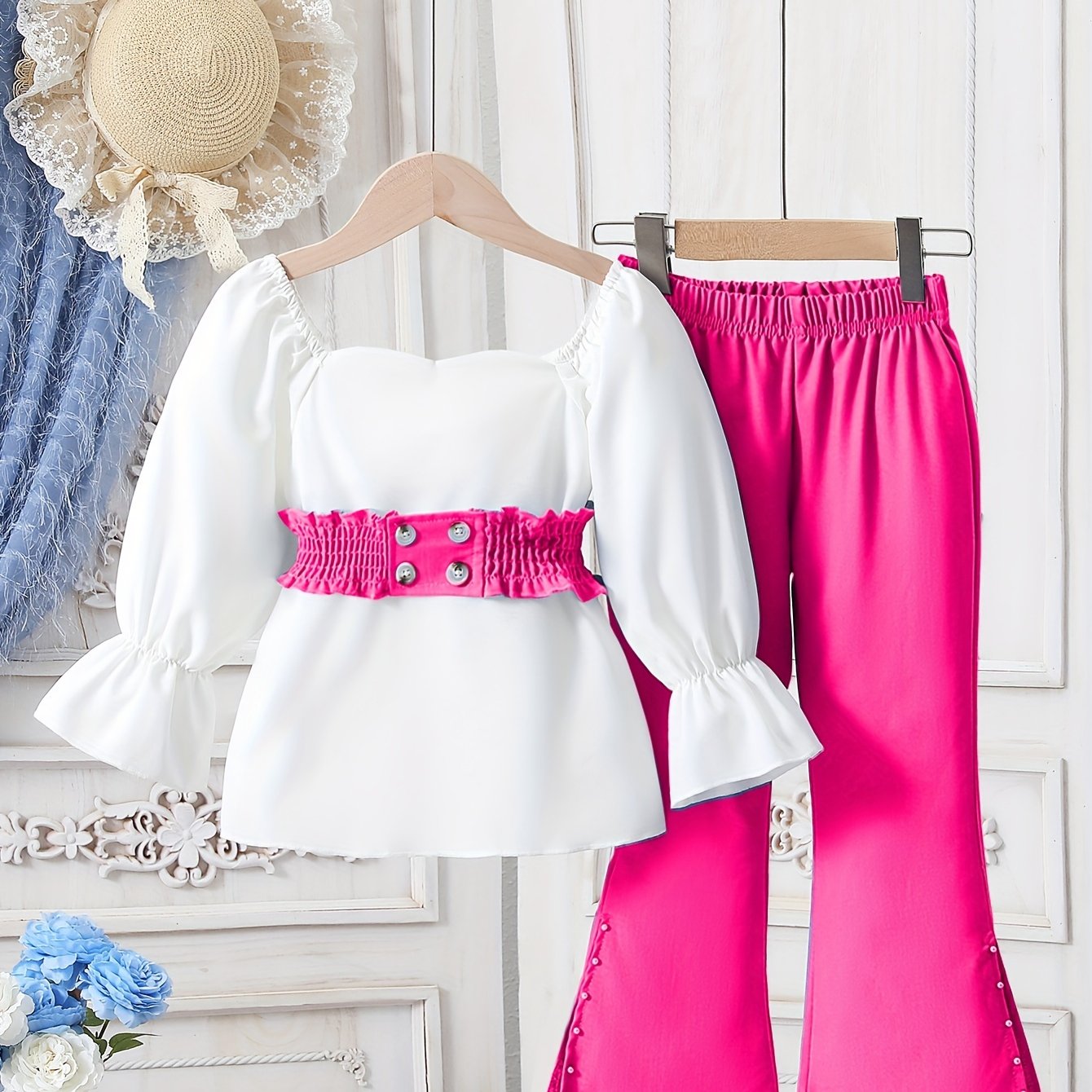 Girls' long pants suit including a waist-cinched long-sleeved top and fashionable bell-bottom pants, suitable for outdoor wear in spring and autumn.