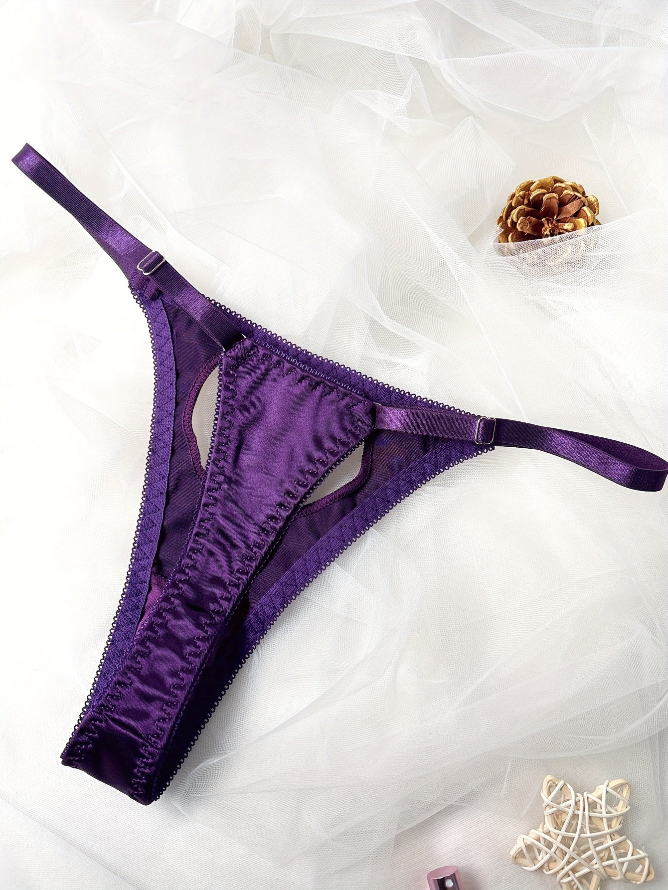 Heart-shaped thong with satin low waist, sexy lingerie for women.