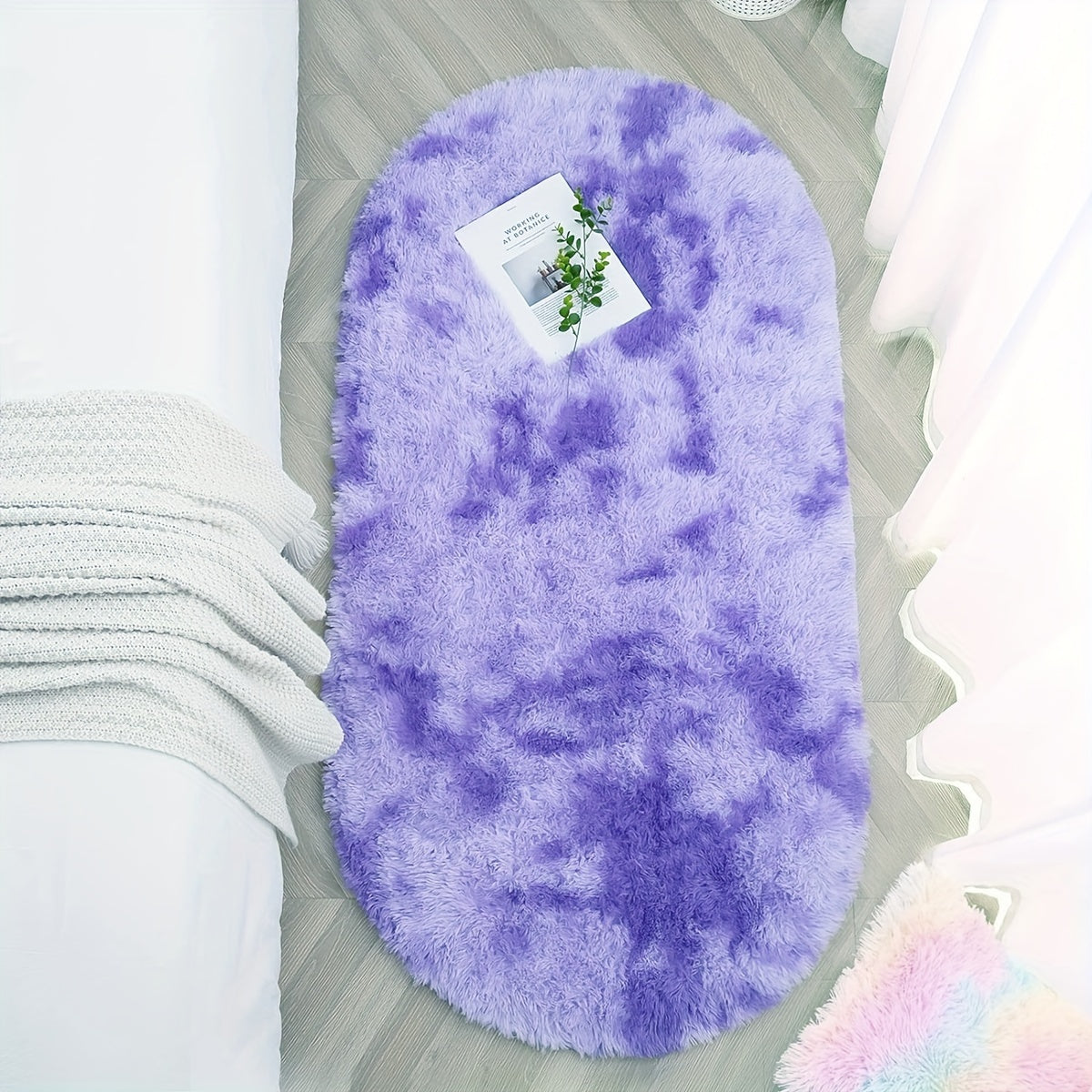 Soft and fluffy oval shaggy area rug, perfect for bedroom or living room. Made with skin-friendly thickened sponge and tufted polyester material. Durable and easy to maintain. Adds decorative touch to indoor spaces such as sofa, bedside, playroom, or