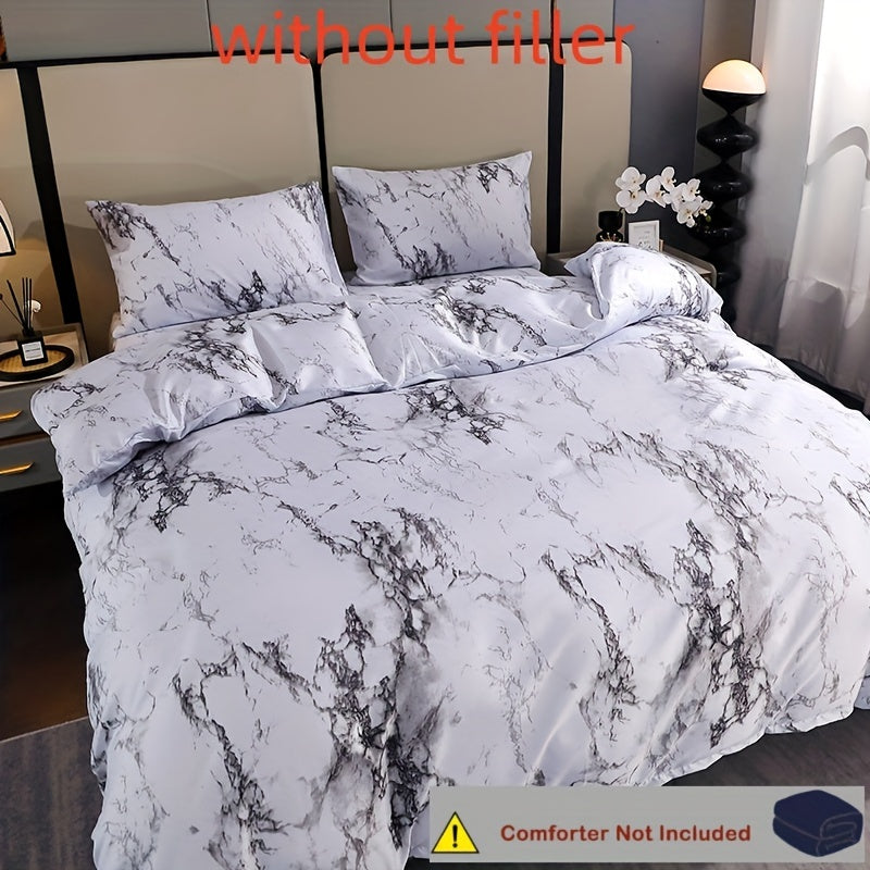 Elevate your bedroom or guest room decor with the 3-piece Elegant White Marble Print Duvet Cover Set. This set includes one soft polyester duvet cover and two pillowcases, all featuring a stylish white marble print. The breathable all-season bedding is