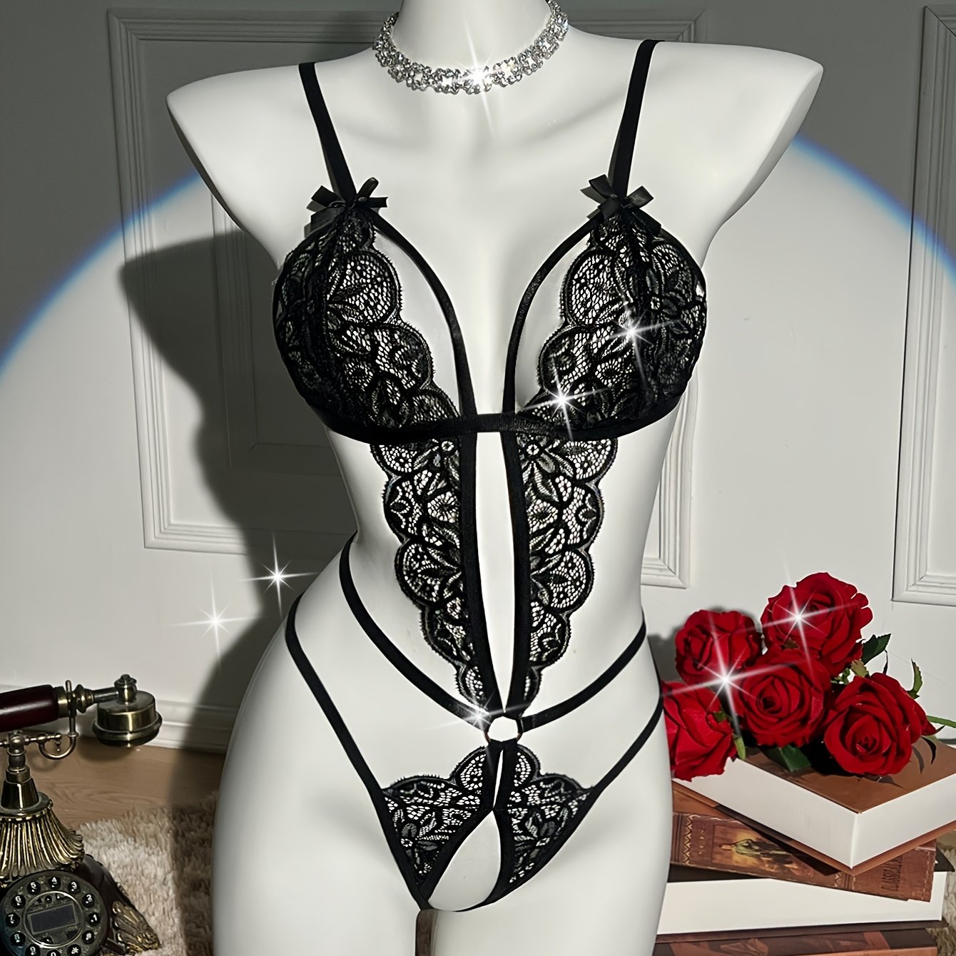 Flower lace teddy with open crotch and sexy bow bodysuit. Flirty lingerie for women.