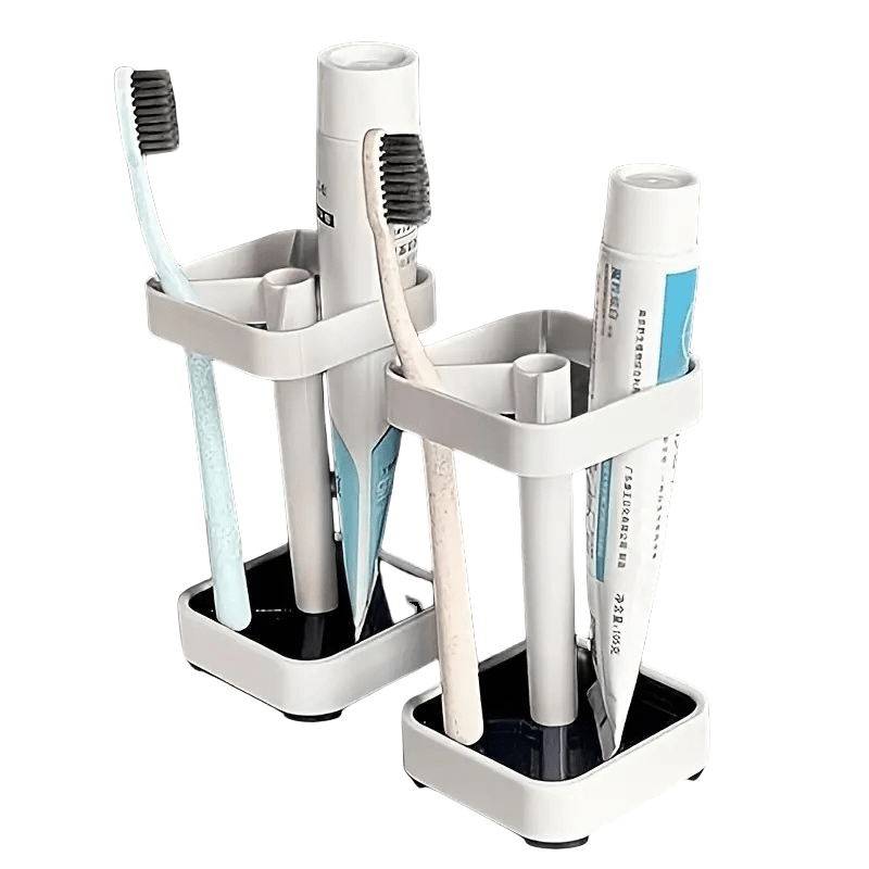 Modernize your bathroom with this sleek white toothbrush holder and cup lid combo. Perfect for organizing electric toothbrushes, toothpaste, dental floss, and razors with its 3 slots. Made from durable plastic, this organizer does not require power and