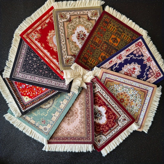 Colorful Turkish rug-inspired table mat with absorbent, spill-proof material. Features decorative floral pattern and tassels, ideal for kitchen and dining. Rectangular shape, measuring 13.46cm x 8.99cm.