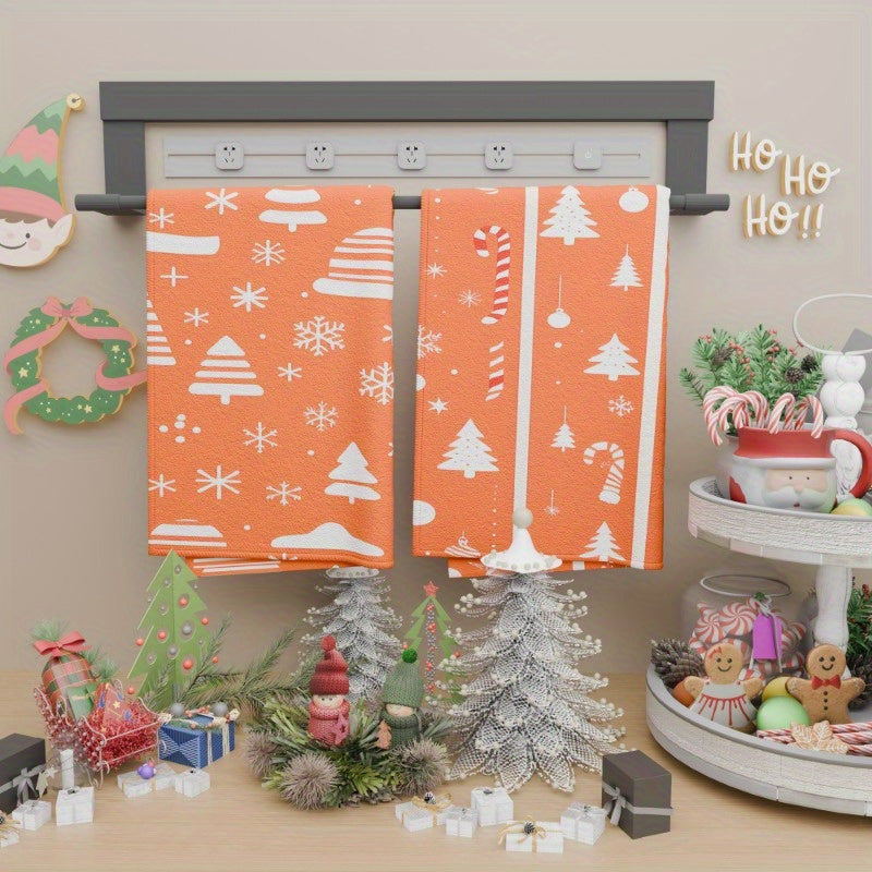 Two pieces of 18*26 kitchen towels, perfect for adding a festive touch to your kitchen during the Christmas season. Made with soft material, these towels feature a wintertime theme with snowflakes and the words "Merry Christmas" printed on them, making