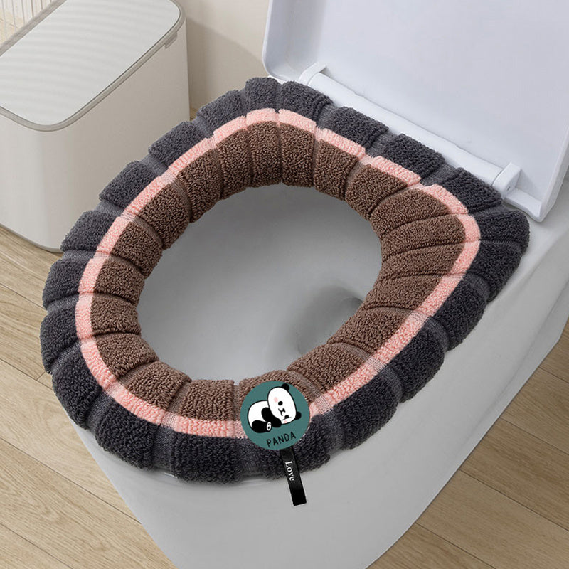 Cozy knit toilet seat cover in brown & black with handle. Soft, washable microfiber for winter warmth.