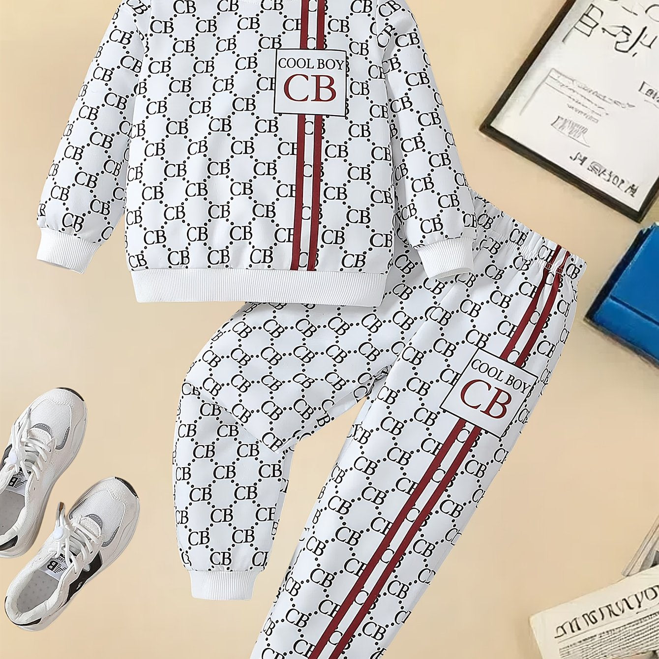 Set of 2 boys' casual crew neck long sleeve T-shirt and pants with alphabet pattern. Made of knit polyester and spandex in a regular fit with medium stretch. Suitable for spring/fall