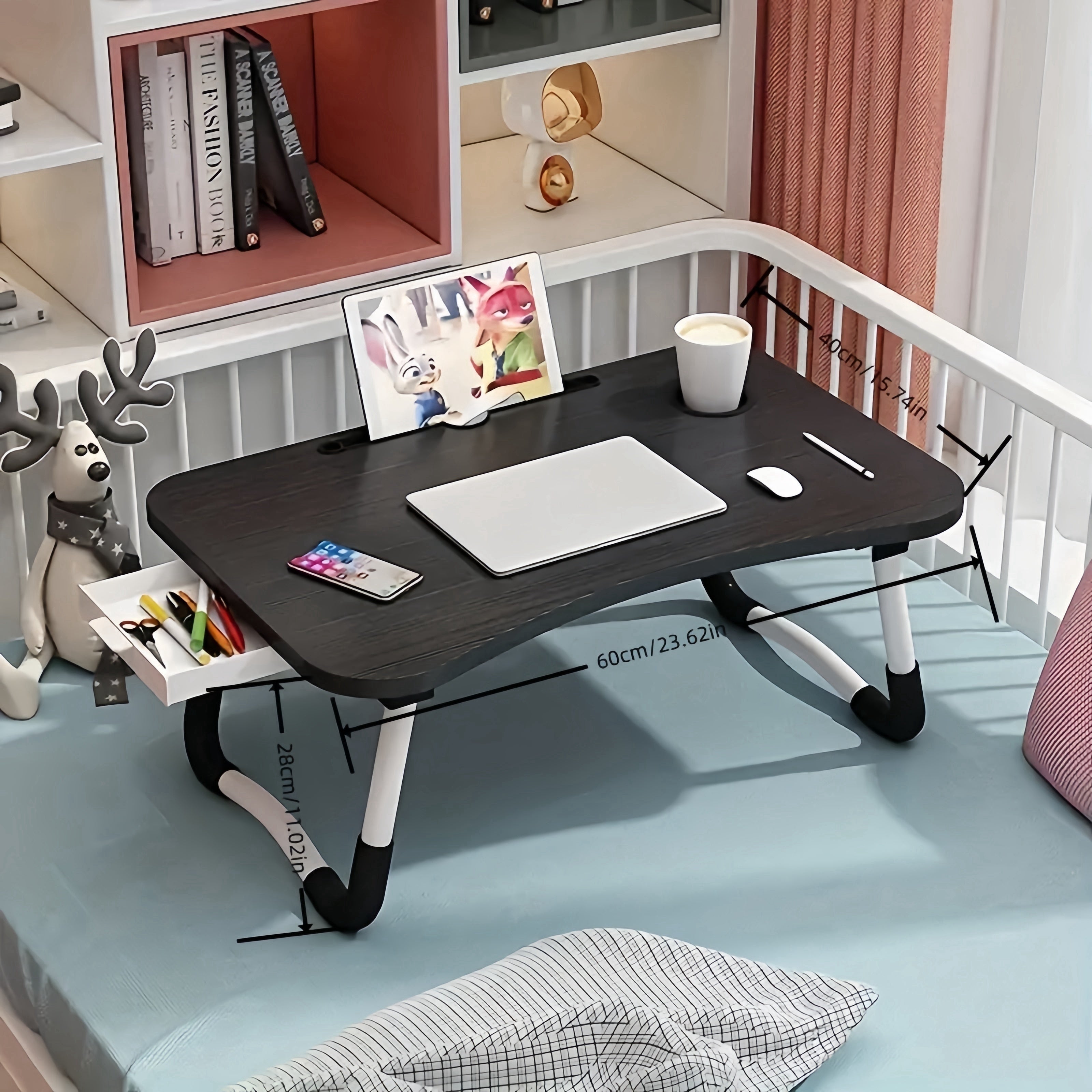 Portable laptop desk with bed tray, cup holder, and drawer made of durable wood fiberboard. Ideal for use on bed, sofa, or floor. Black color.