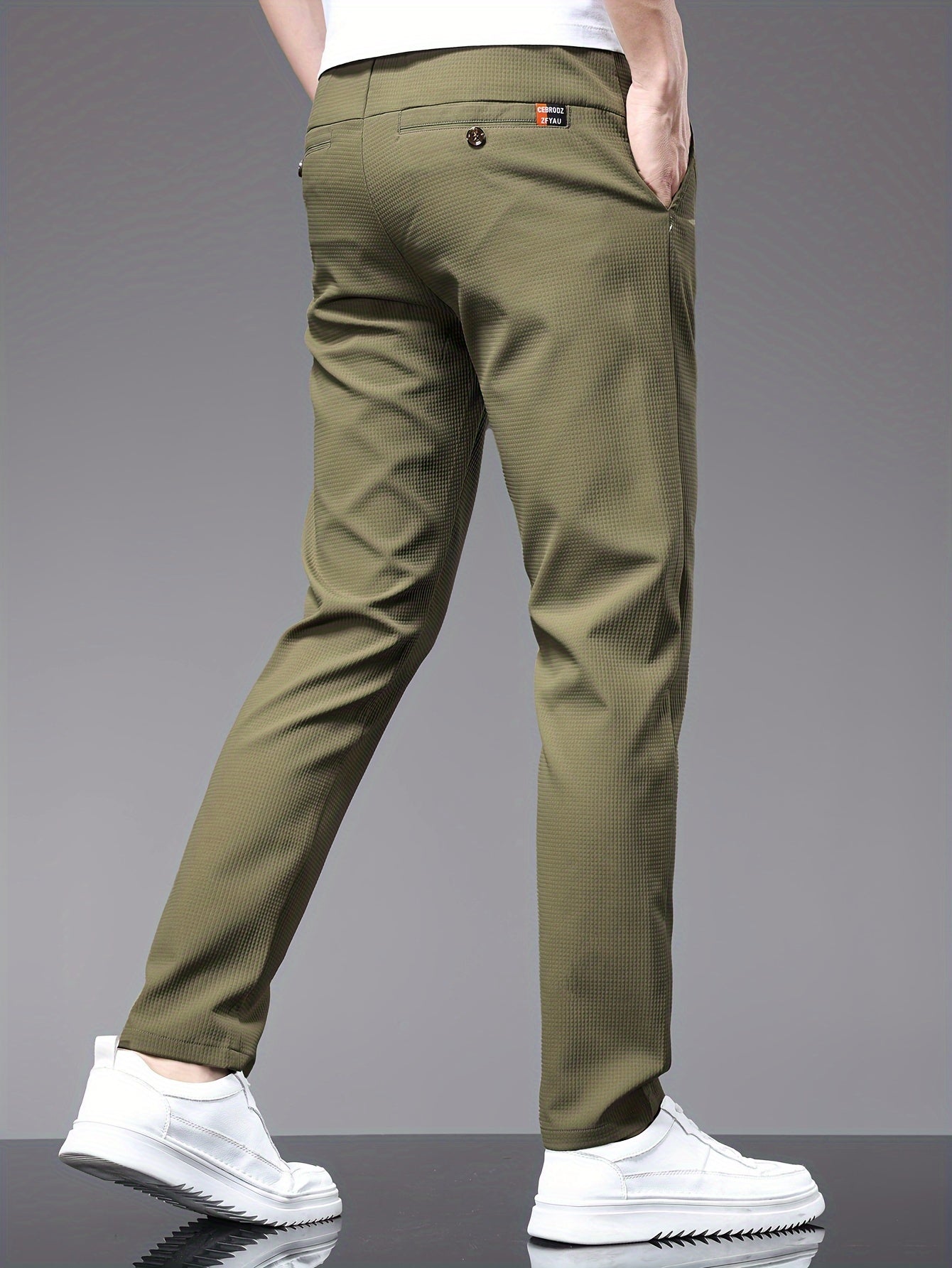 Men's slim fit pants with pockets, perfect for outdoor activities in spring and autumn.