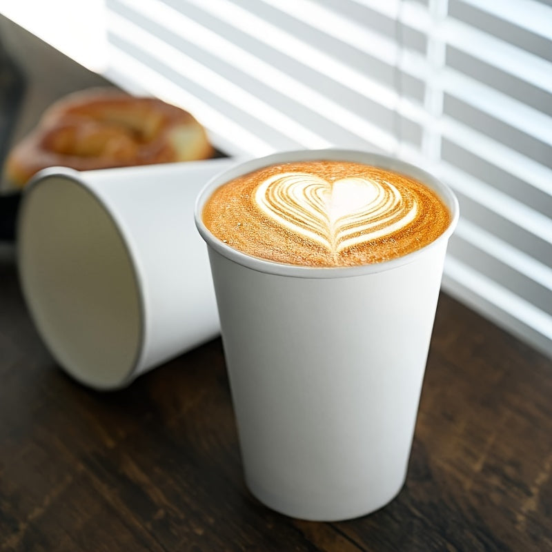 Disposable paper cups in packs of 50, 100, 200, or 500. Each cup has a 200ml capacity and is versatile for both hot and cold beverages. The uncoated white cups are perfect for parties, cafes, and business use. Please hand wash only. - YiYan1