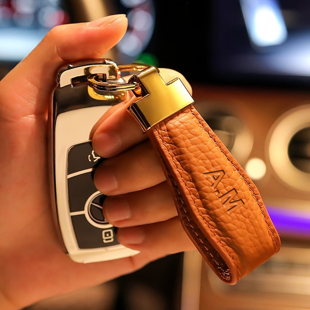 Get a custom engraved initial car key ring with climbing hook on this 1pc Personalized Microfiber Faux Leather Keychain. This unisex fashion accessory is perfect for both men and women and makes an ideal gift for Valentine's Day, Thanksgiving, Christmas