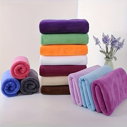 Modern microfiber hair towel with polka dot pattern, soft and quick-dry, perfect for hair care and beauty.