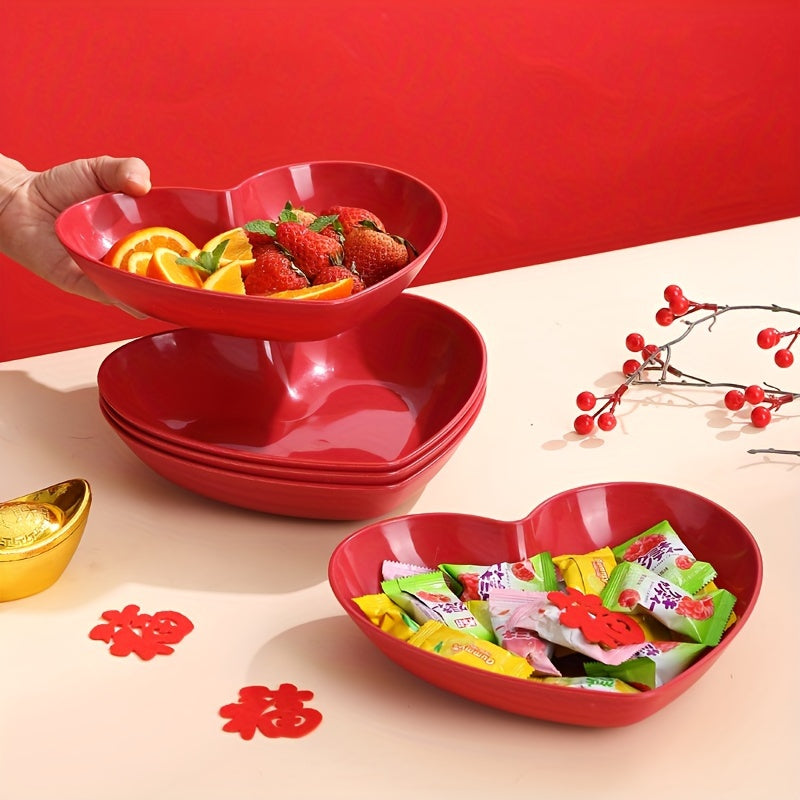 Heart-shaped plastic plates for weddings in sets of 4 or 8. Decorative red serving dishes for snacks, salads, and candy. Versatile party platters for all seasons.