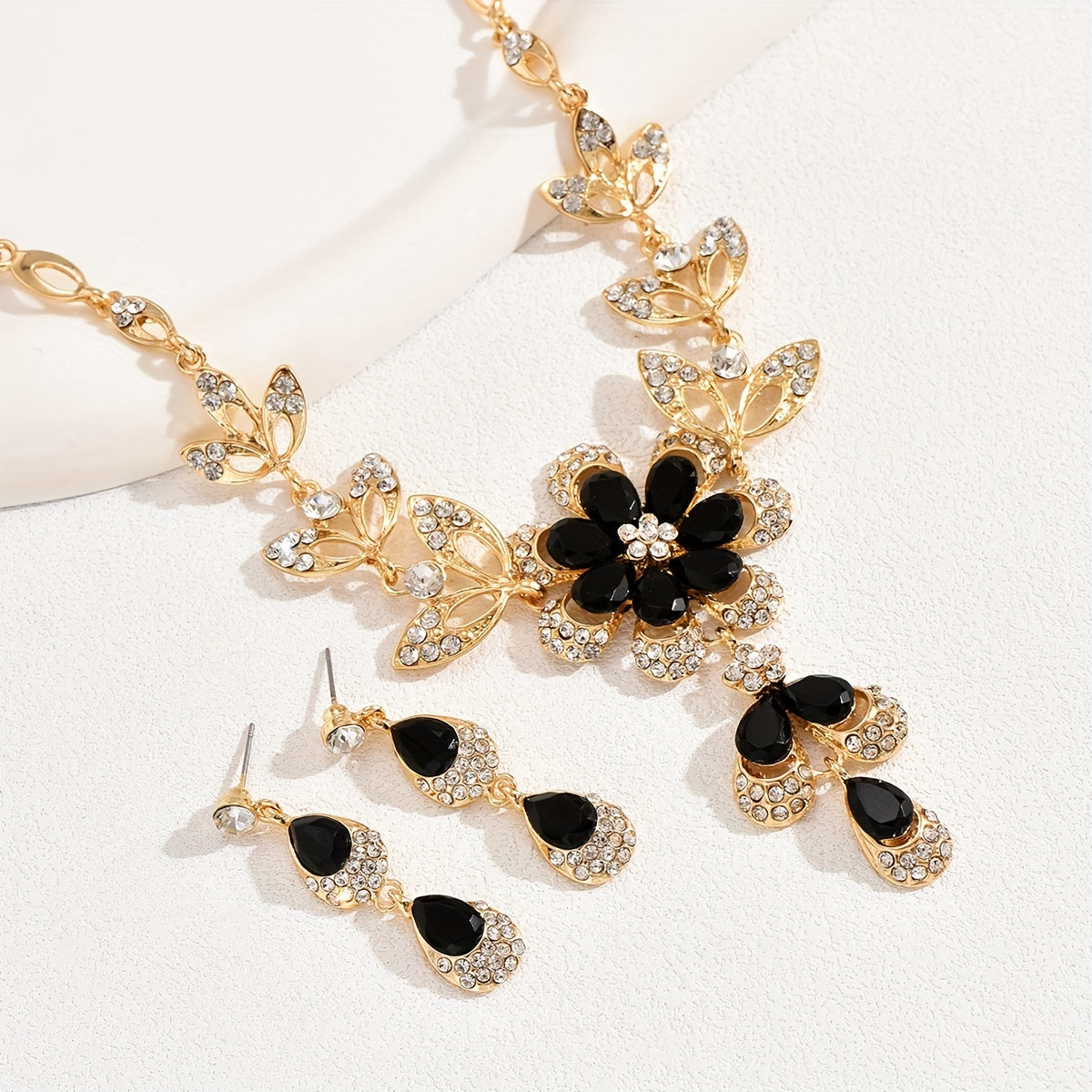 Boho Vacation Style Jewelry Set: 14k Gold Plated Zinc Alloy with Synthetic Zirconia Flower Earrings and Necklace for Women. Perfect for Parties, Weddings, and Spring Season.