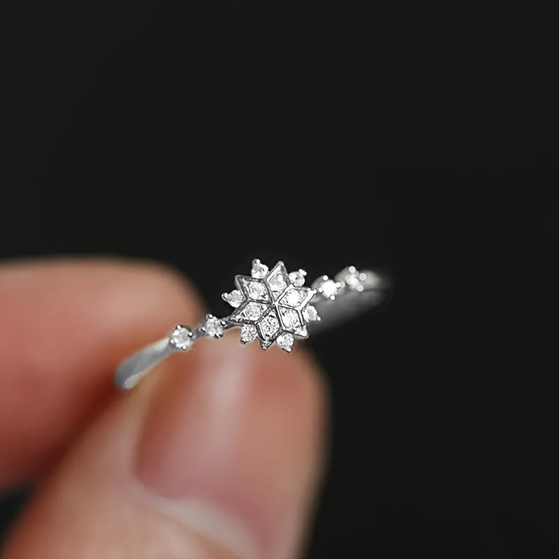 High-quality Promise Ring made of 925 Sterling Silver with a Sparkling Snowflake Design featuring Shining zirconia stones, perfect for Engagement or Wedding.