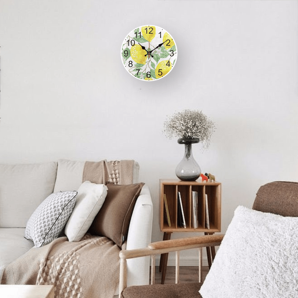 Fruit theme wall clock with golden lemon pattern design, silent non-ticking, AA battery operated. Ideal for living room and kitchen decor.