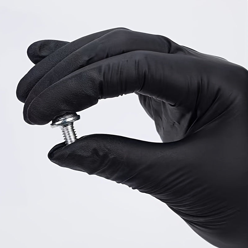 Get a pack of black disposable nitrile gloves in sets of 100, 50, or 20 pieces. These gloves are perfect for a variety of tasks such as kitchen dishwashing, cleaning, tattooing, working in hotels, hair salons, and pet care. They are essential tools for