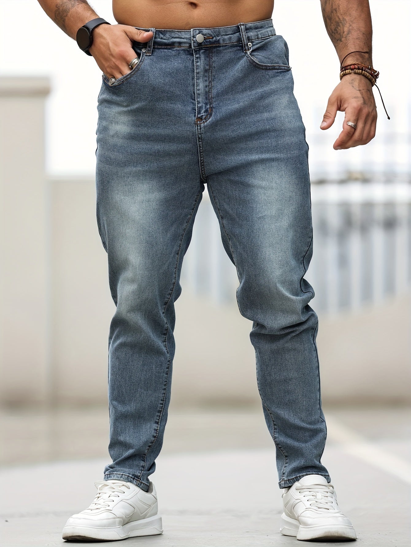 Men's plus size skinny jeans made of 68% cotton, 24% polyester, 6% tencel, and 2% elastane. Features casual solid color denim with pockets and medium stretch. Suitable for all seasons.