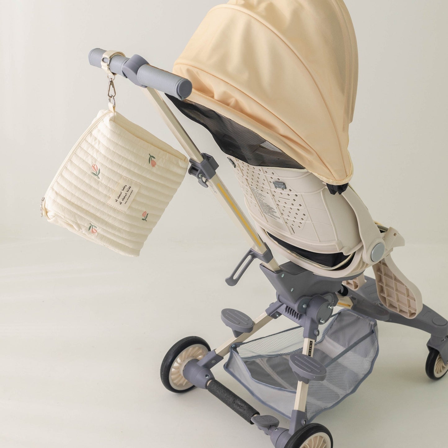 Embroidered Cotton Mommy Bag with Zipper Closure for Stroller Hanging, suitable for Diaper Bag use.