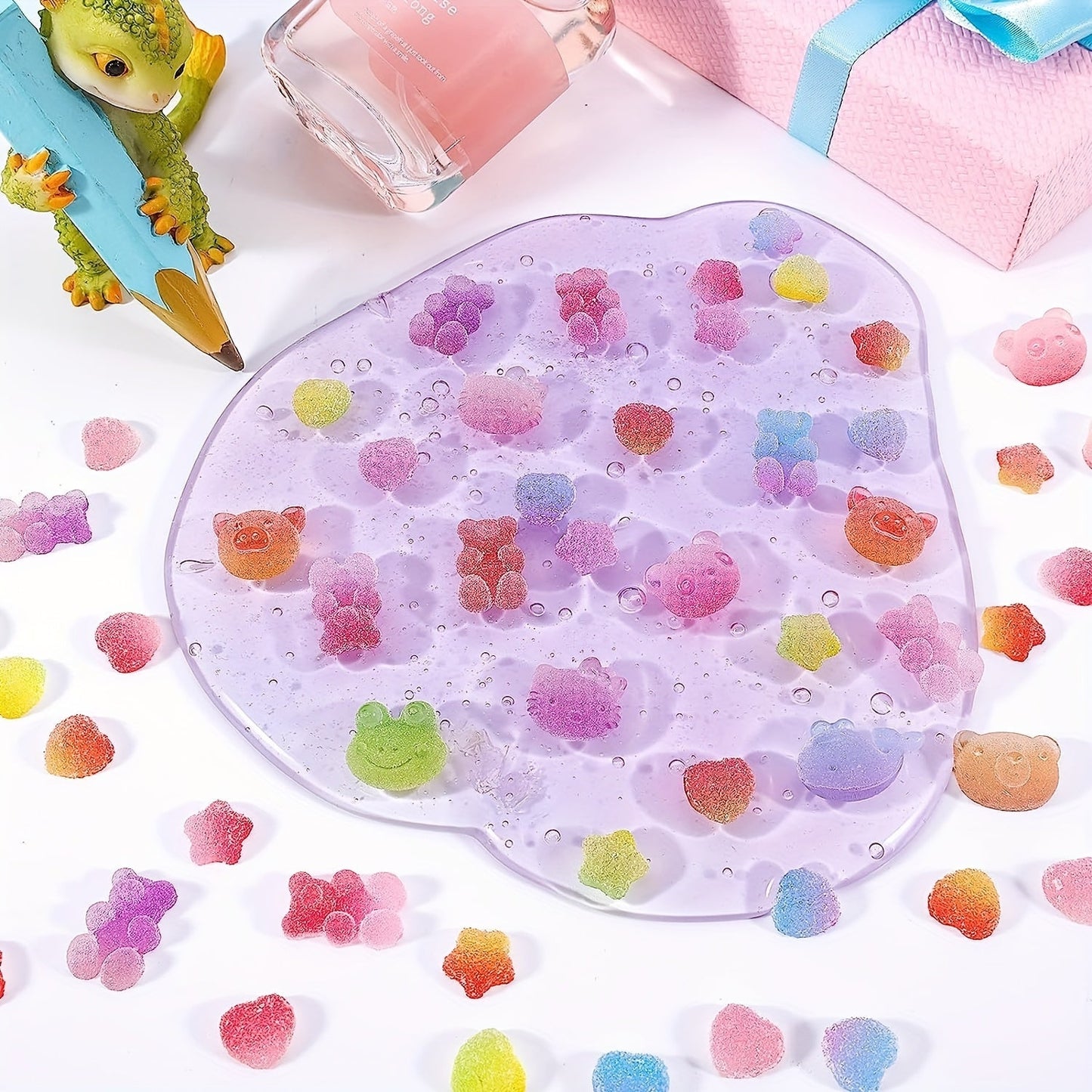 Get 120 pieces of adorable Slime Charms featuring Kawaii Candy designs, 3D Nail Charms, and Mini Flatback Beads in the shape of Gummy Bears. Perfect for creating your own unique resin jewelry, cell phone decorations, scrapbooking embellishments, and DIY