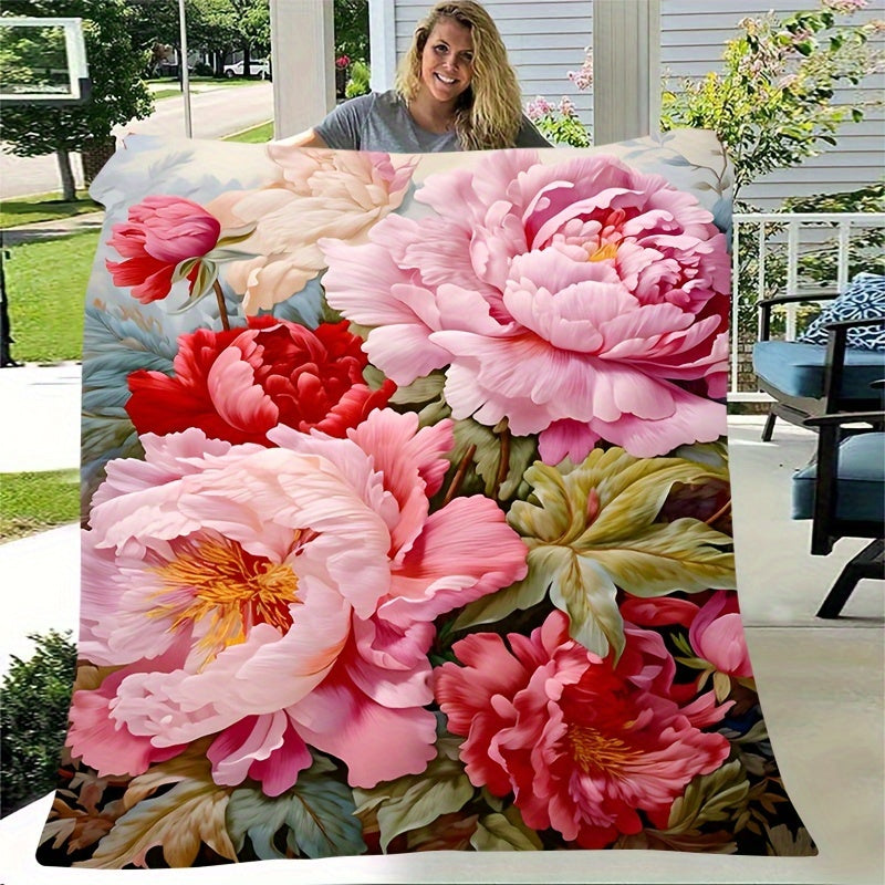 Soft and durable flannel throw blanket featuring a charming floral print. This versatile blanket is perfect for all seasons and can be used on the couch or bed. Easy to care for with machine washable material. Add a unique decorative touch to your