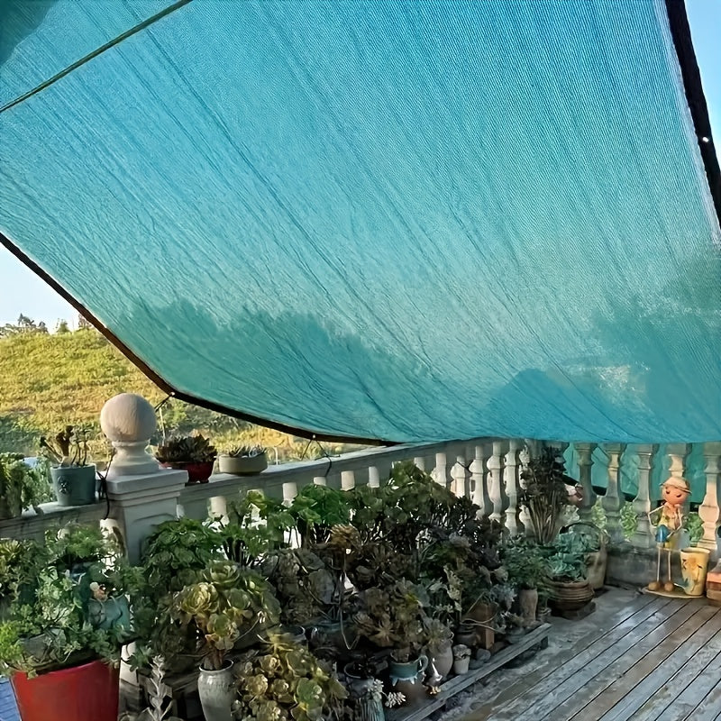 Dark green polyethylene sunshade net for outdoor garden with UV protection and breathability.