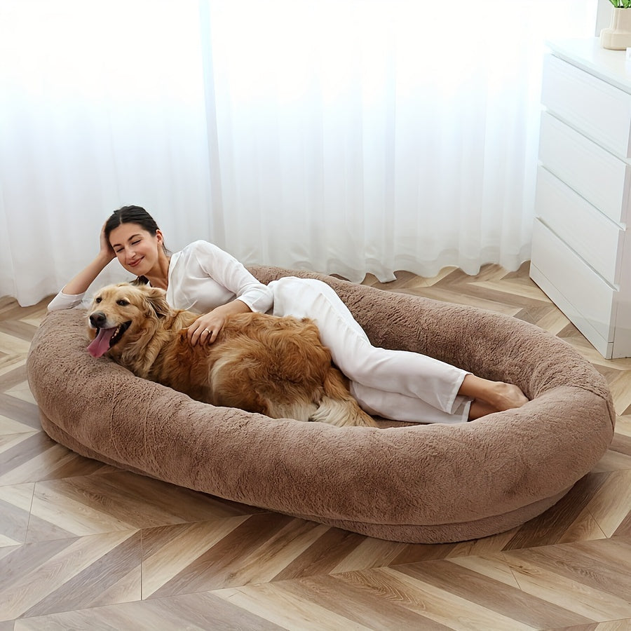 Oversized human & pet bed with memory foam fill and washable cover for medium to large breeds.