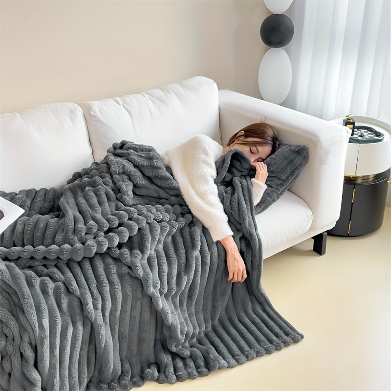 Machine washable, this luxurious double-sided throw blanket is made of faux rabbit fur that is warm, soft, and cozy. Perfect for naps, office use, outdoor camping, or on the sofa. The soft striped design adds a touch of elegance, making it a perfect gift