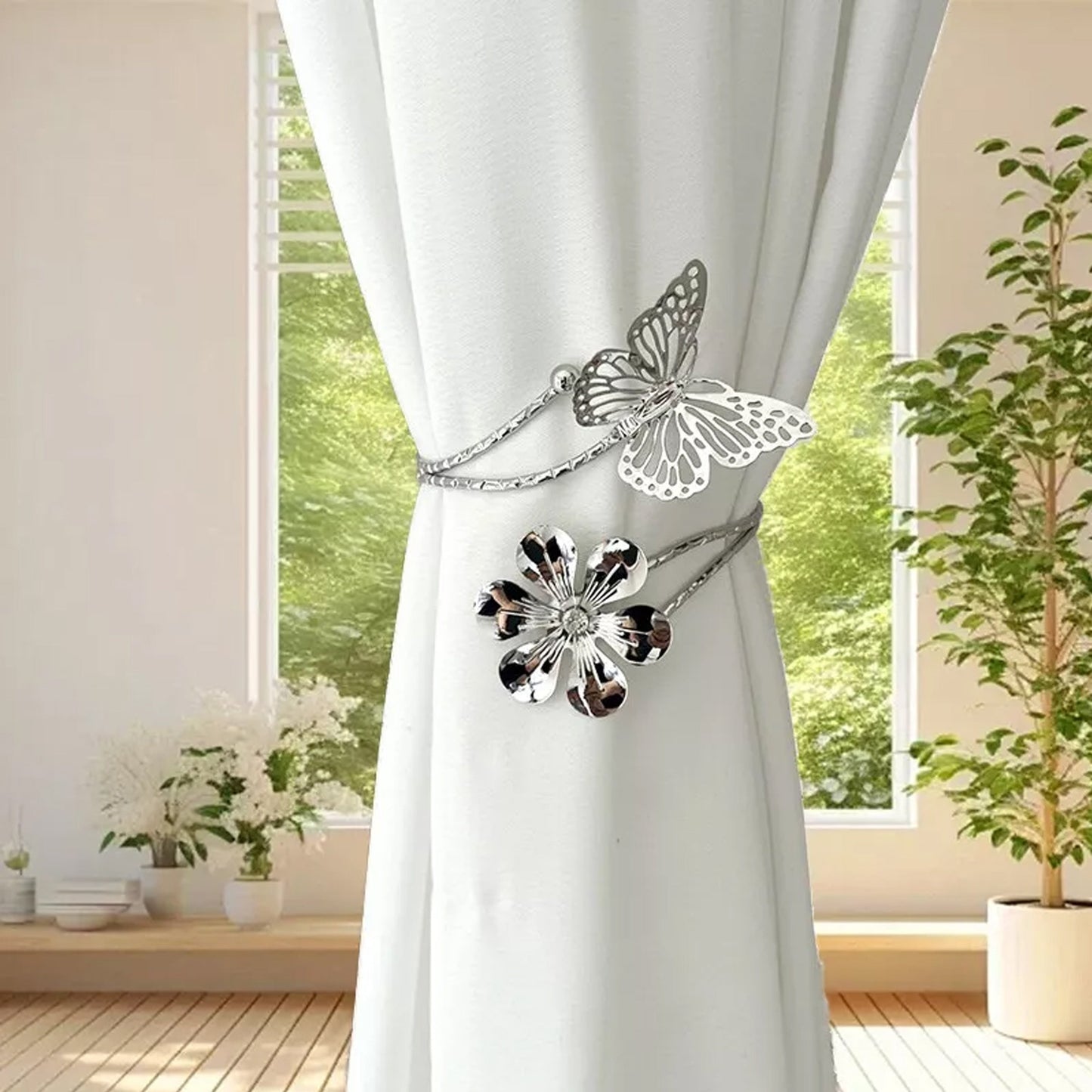 Add a touch of elegance to your home decor with these modern minimalist curtain tiebacks. Crafted in a golden/silvery butterfly and flower design, these adjustable holders can be easily installed without drilling. Perfect for the living room, bedroom, or