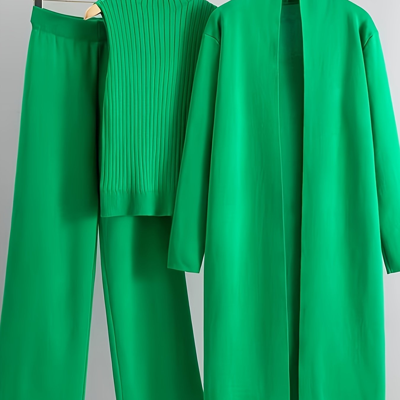 2024 women's three-piece knit set with wide-leg pants, cardigan, and turtleneck sweater.