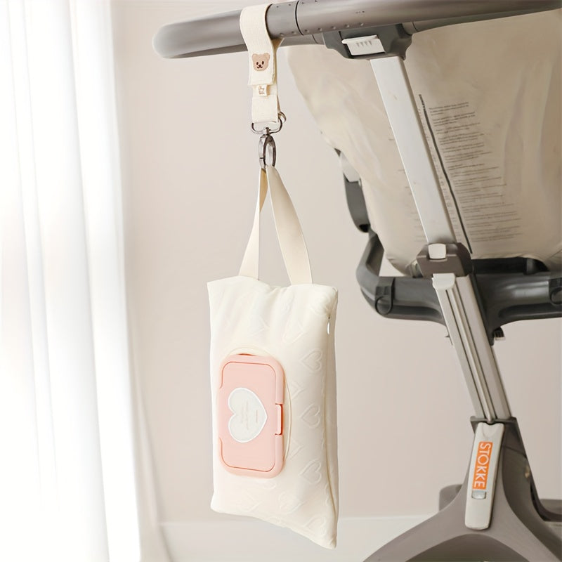 Travel in style with the Large-Capacity Heart-Shaped Tissue Holder - Convenient and Portable Flip-Top Design for Diapers and Wipes - Perfect for Babies and Toddlers.