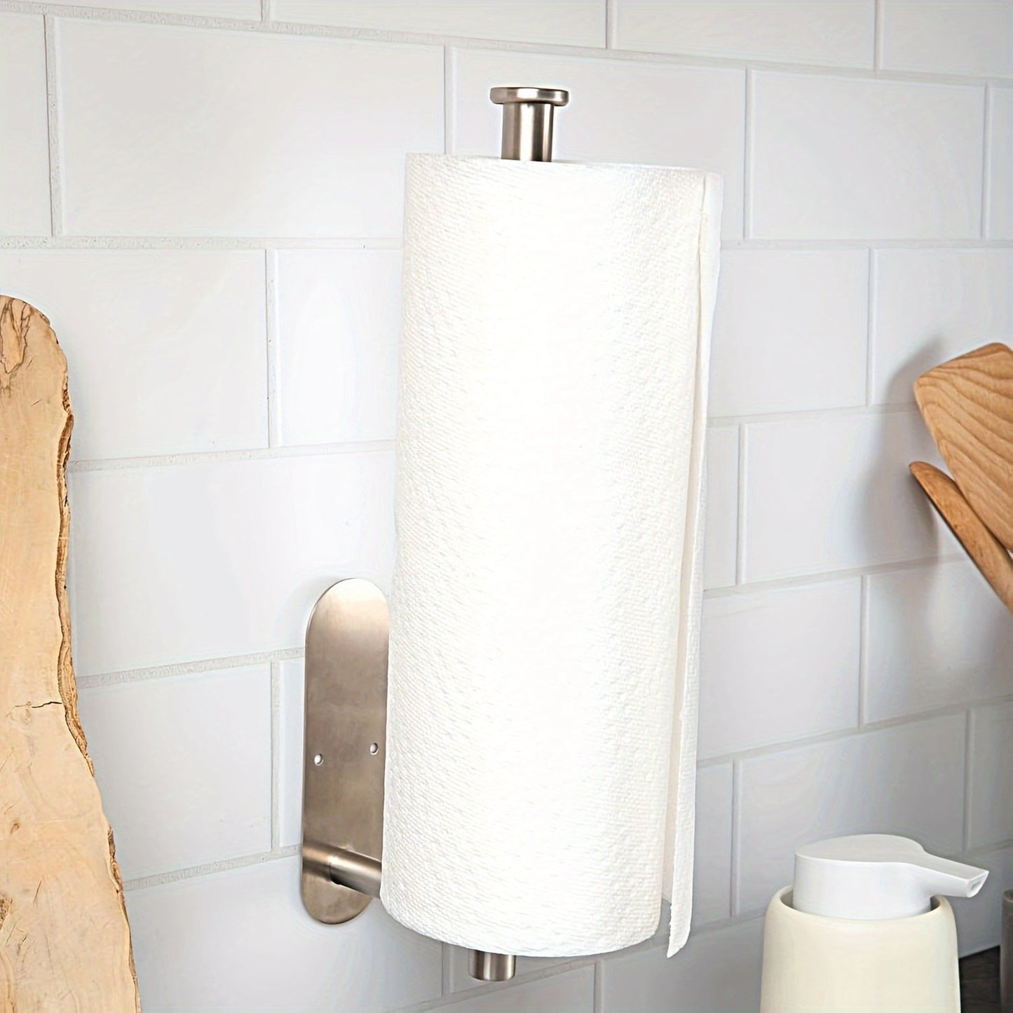 Stylish and convenient, the Modern Stainless Steel Wall Mount Paper Towel Holder in Brushed Silver is the perfect kitchen accessory for easy access to your paper towels. This sleek dispenser is designed to keep your paper towels organized and within