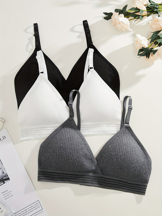 Soft, versatile bra set with removable pads and ribbed texture in black, white, and gray. Perfect for everyday comfort wear.