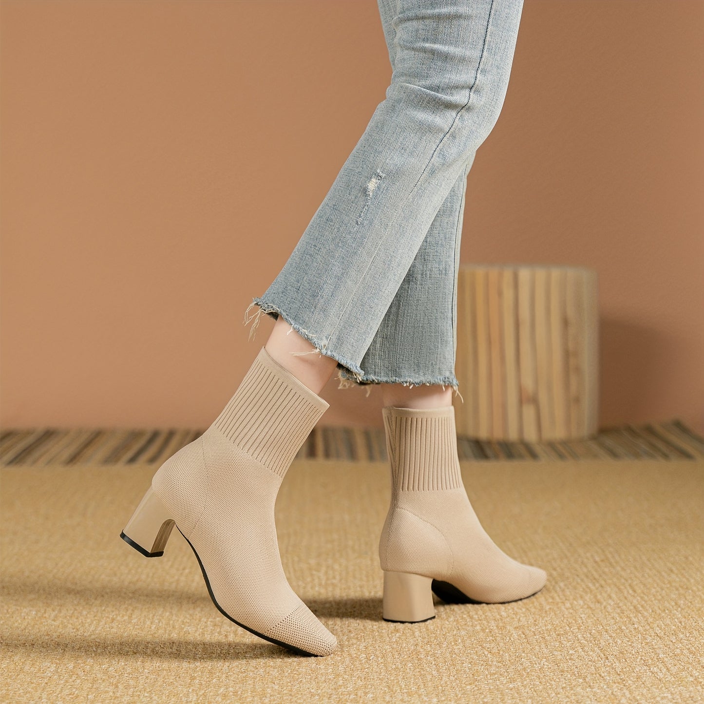 Women's square toe sock boots with high heel, solid color knit design, stretchy slip on style.