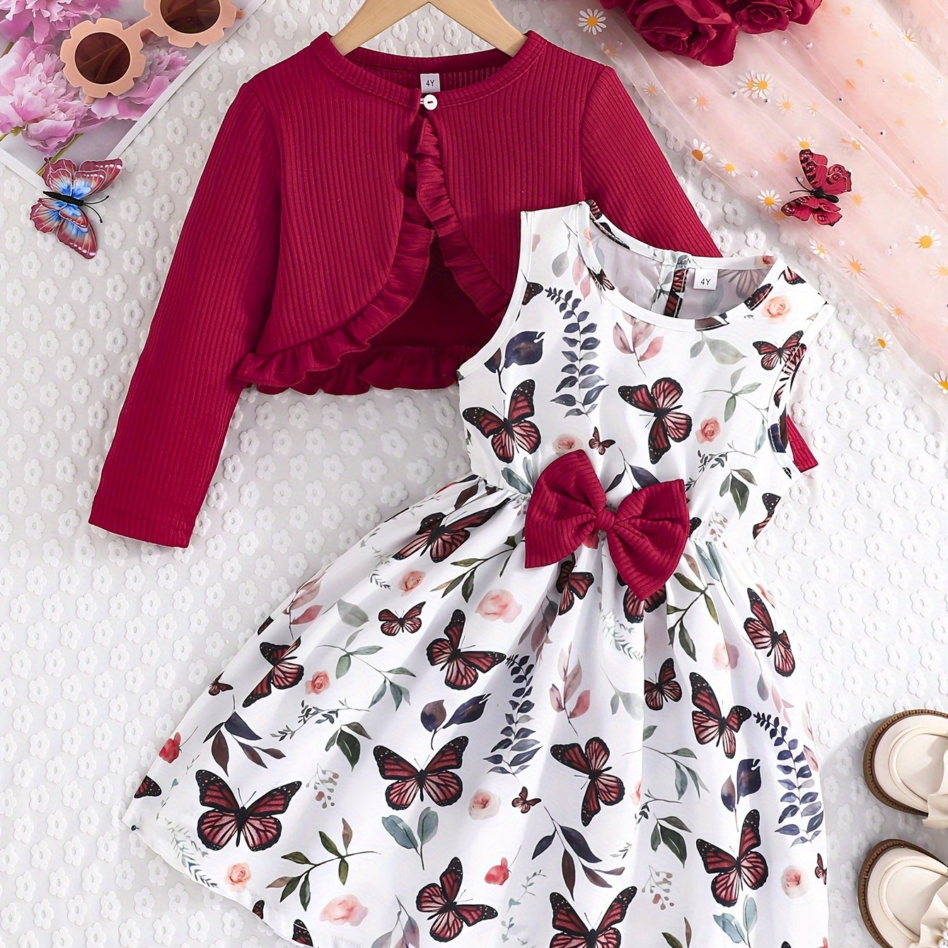 Girls casual dress with butterfly print, paired with a solid color long-sleeved jacket for an outdoor outfit.